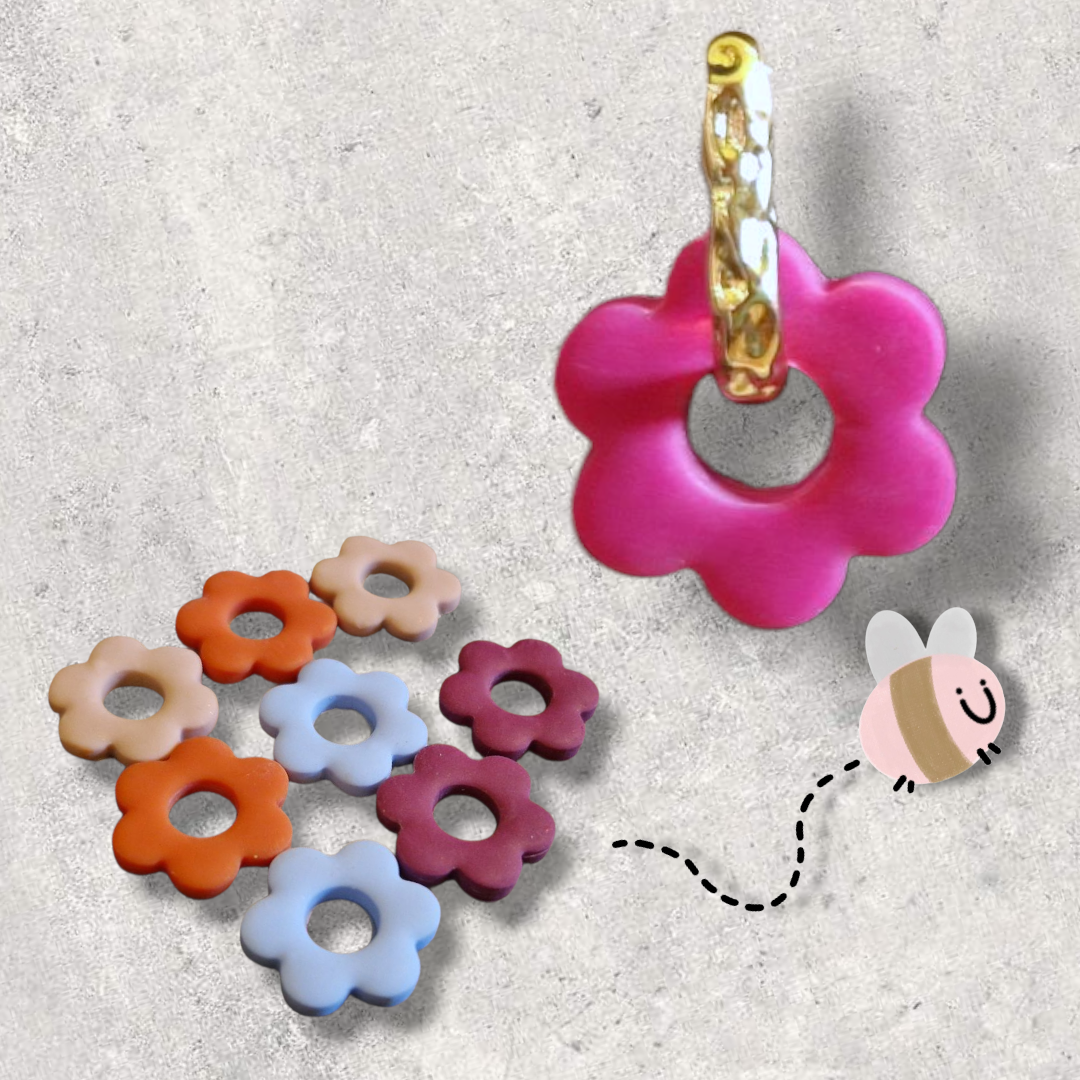 Hoop oorbel reliëf S goudkleurig